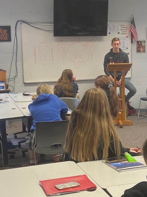 Aaron Whitaker sharing in Christ and Culture class